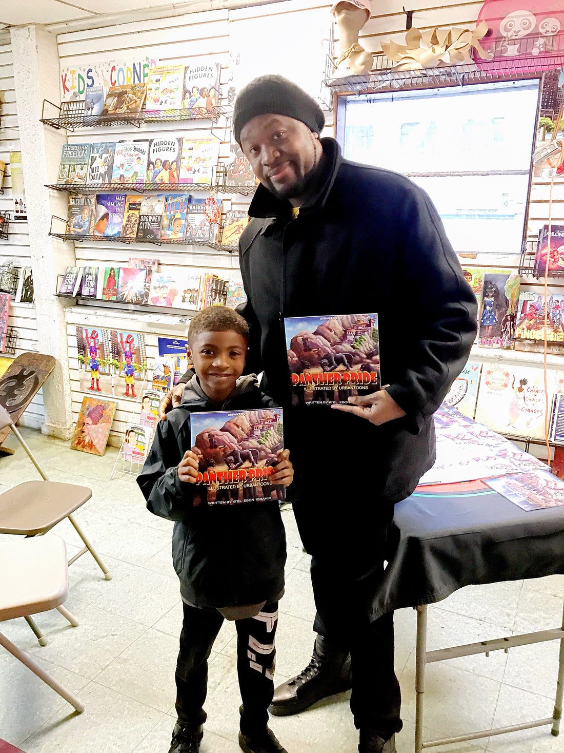Urbantoons Panther's Pride children's book singing at the Black and Nobel book store.